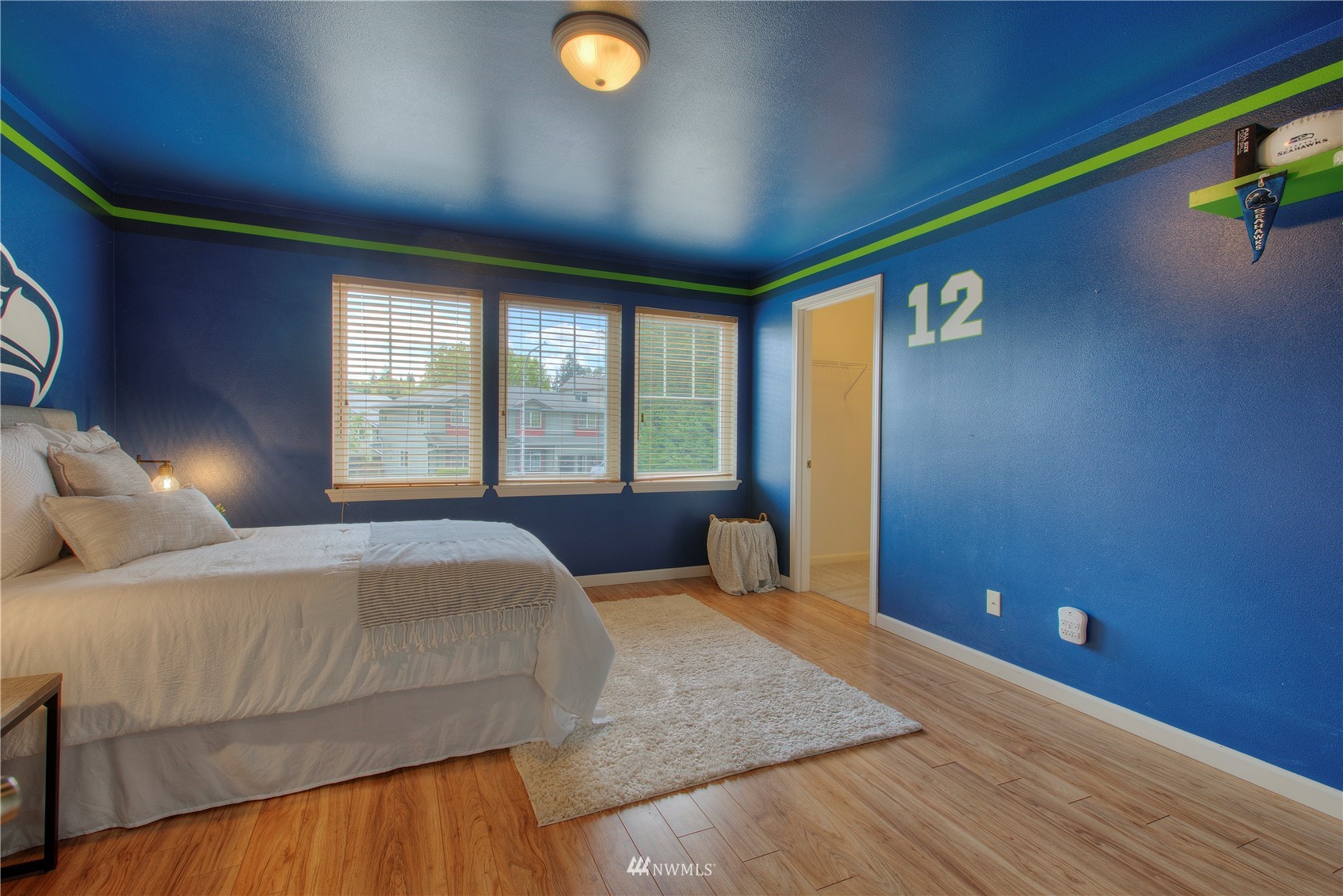1127 R Street Northwest Auburn, WA 98001 - Photo 24 of 37 a bedroom with a bed and a window