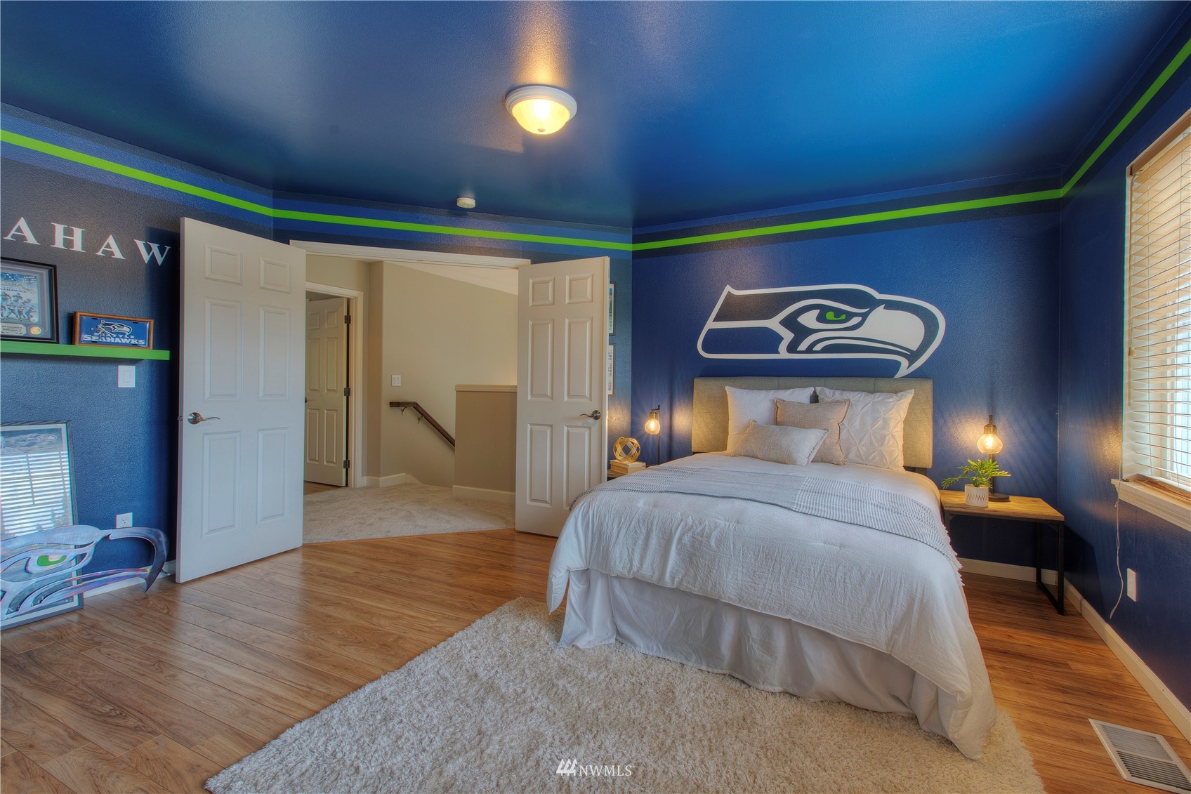 1127 R Street Northwest Auburn, WA 98001 - Photo 25 of 37 a bedroom with a bed and a table