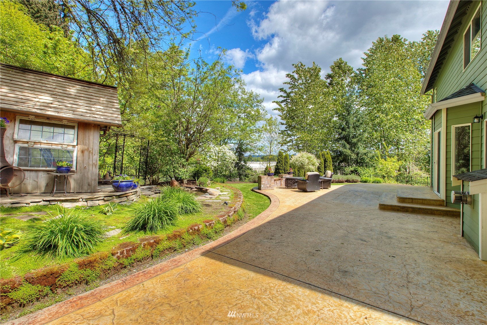1127 R Street Northwest Auburn, WA 98001 - Photo 31 of 37 a view of a house with swimming pool