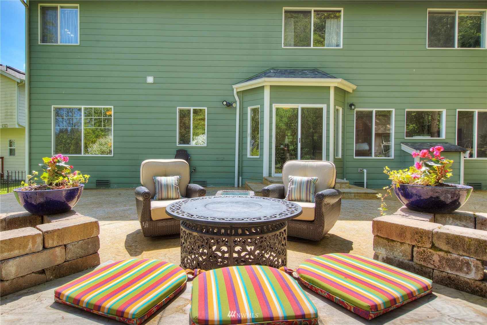 1127 R Street Northwest Auburn, WA 98001 - Photo 32 of 37 a front view of a house with outdoor seating