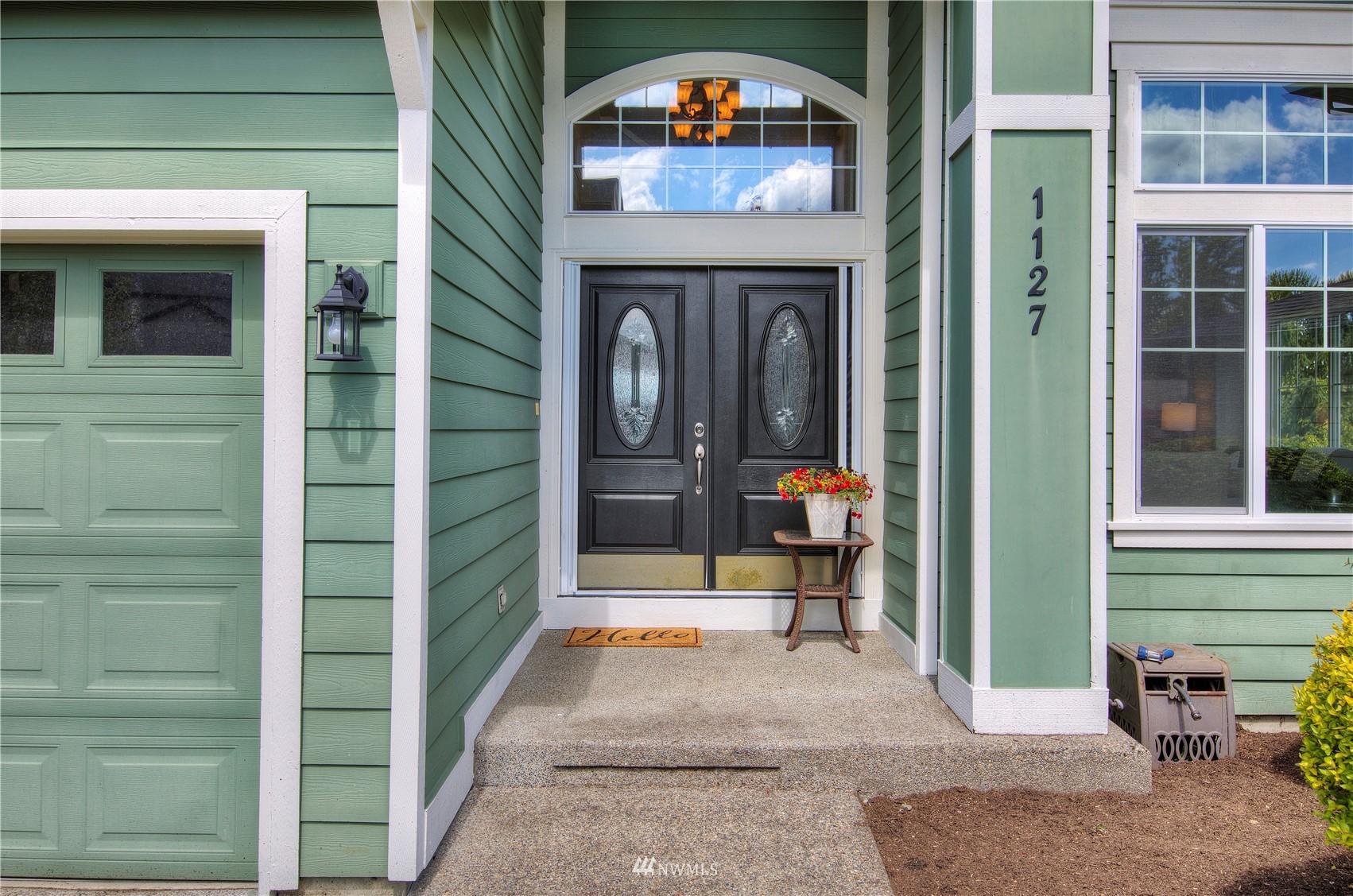 1127 R Street Northwest Auburn, WA 98001 - Photo 4 of 37 a view of lobby with a door and balcony