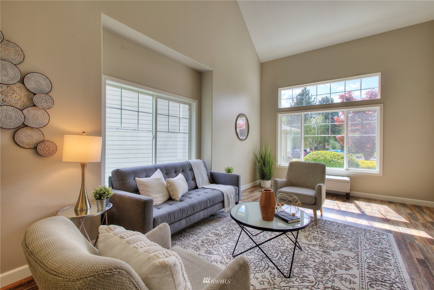 1127 R Street Northwest Auburn, WA 98001 - Photo 8 of 37 a living room with furniture and a window