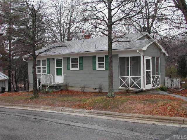 425 Ellen Street Roxboro, NC 27573 - Photo 1 of 1 a front view of a house with a yard