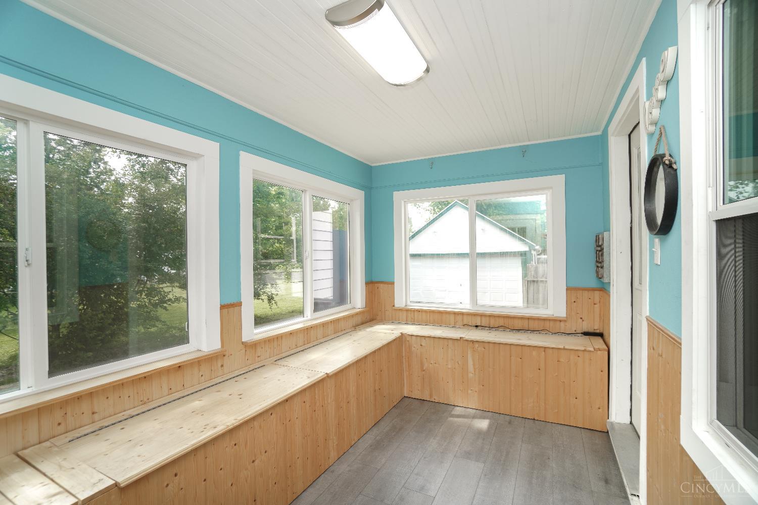 168 West Foster-Maineville Road Maineville, OH 45039 - Photo 25 of 35 Brand new LVT flooring is durable in this bright porch.