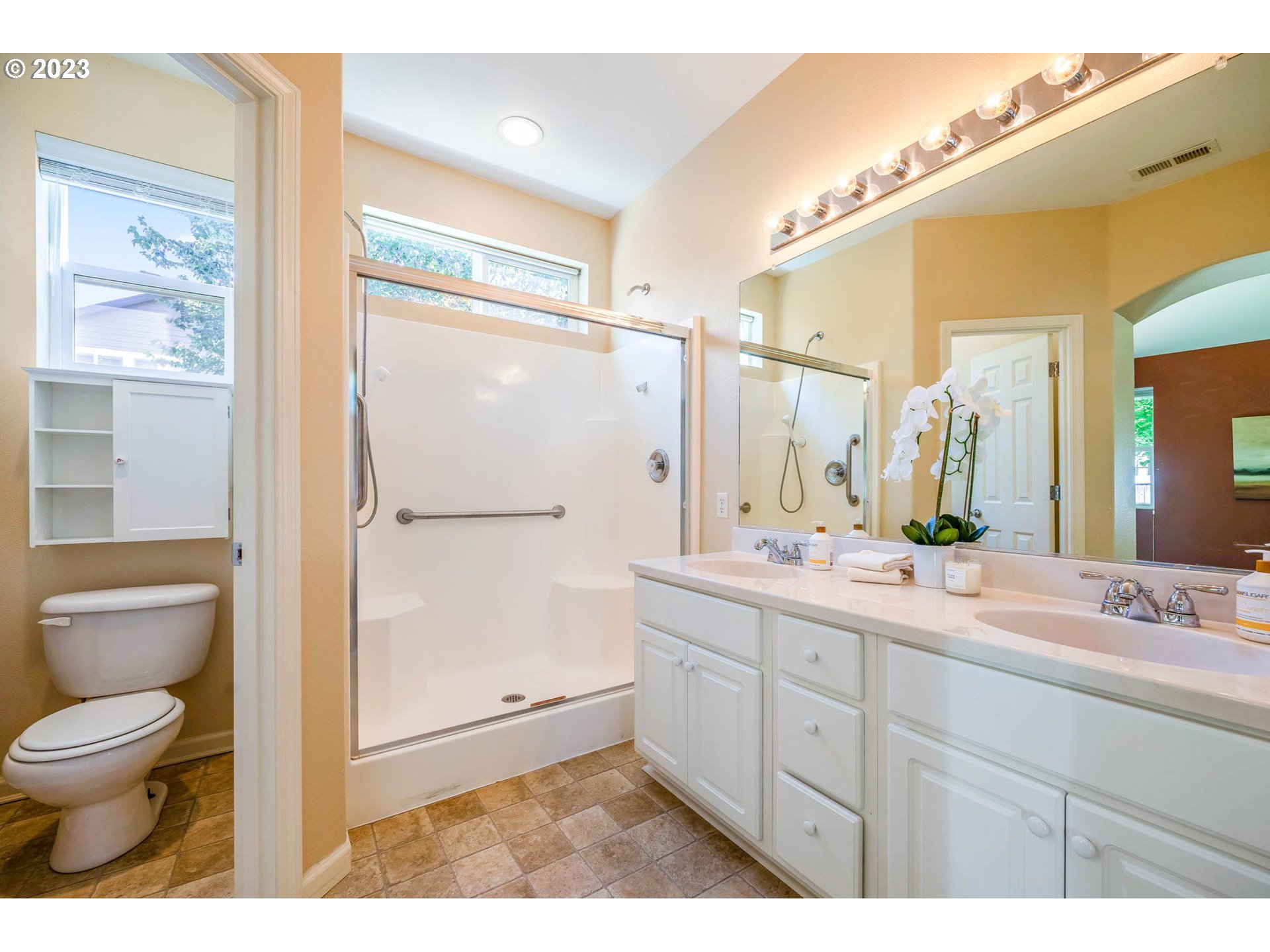 5408 Jeffrey Way Eugene, OR 97402 - Photo 20 of 37 a bathroom with a sink a toilet and shower
