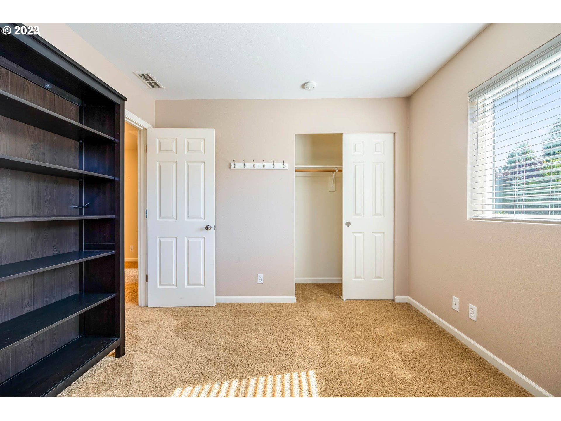 5408 Jeffrey Way Eugene, OR 97402 - Photo 26 of 37 a view of an empty room with cabinet and a window