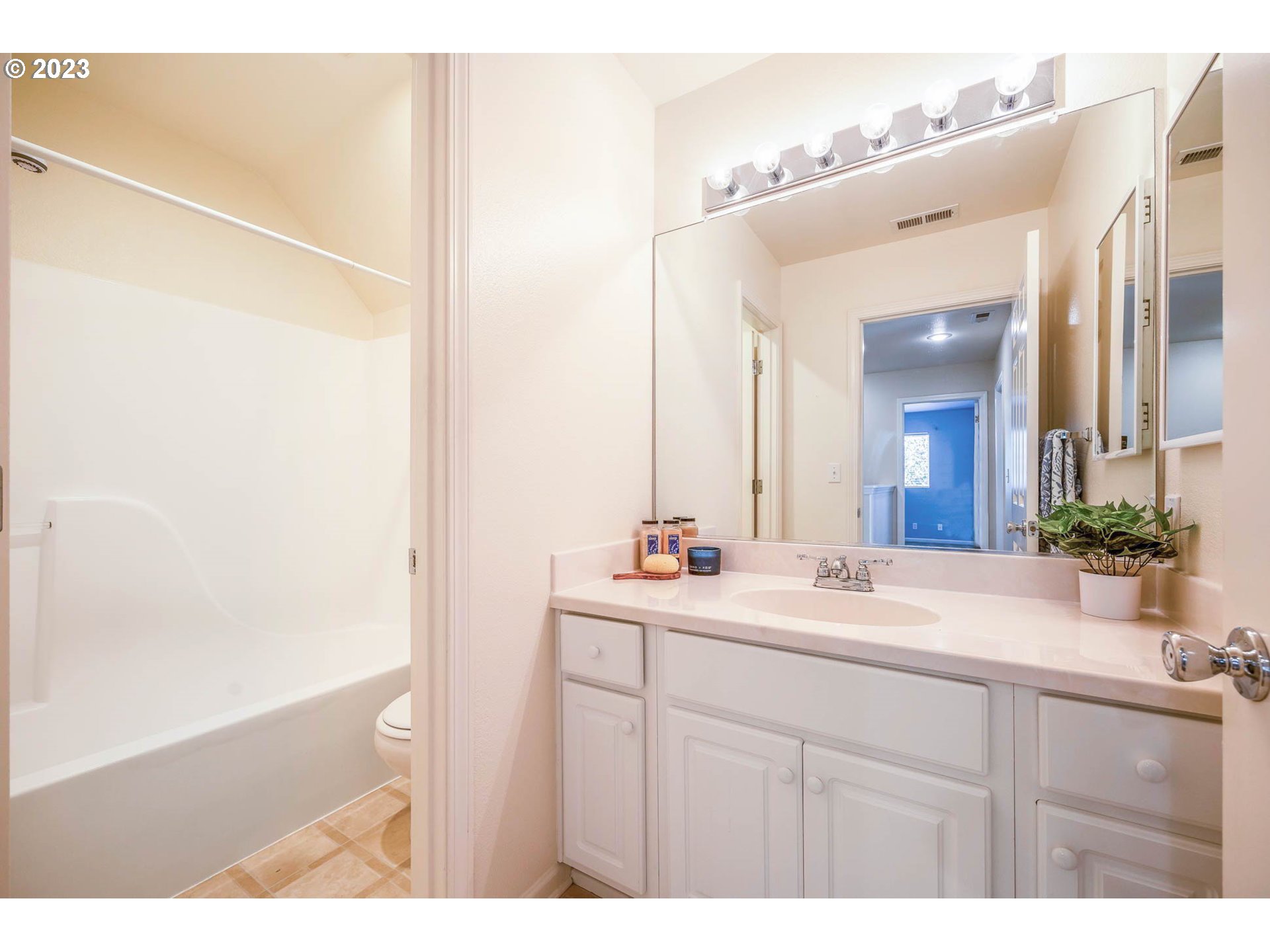 5408 Jeffrey Way Eugene, OR 97402 - Photo 27 of 37 a bathroom with a sink and a mirror