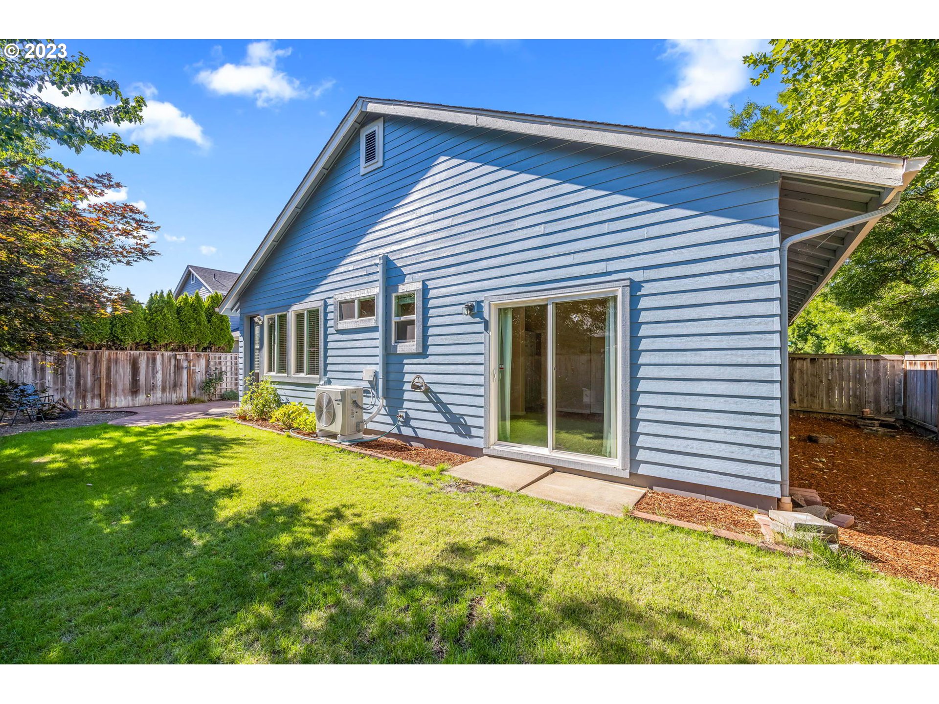 5408 Jeffrey Way Eugene, OR 97402 - Photo 32 of 37 a view of a house with a yard