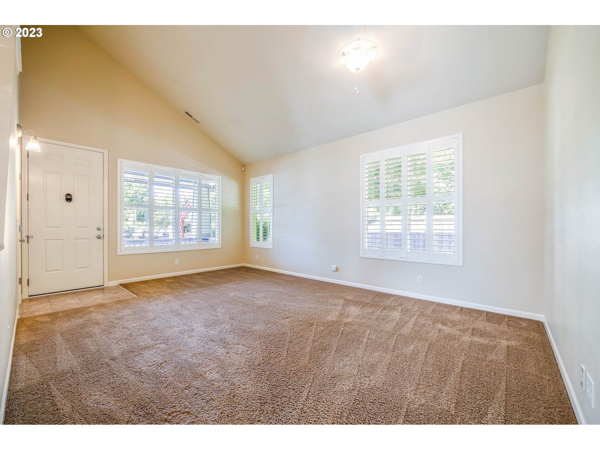 5408 Jeffrey Way Eugene, OR 97402 - Photo 4 of 37 a view of an empty room with a window