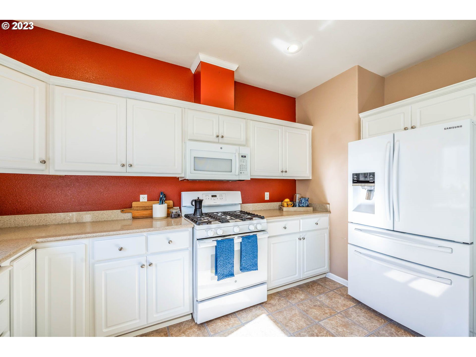 5408 Jeffrey Way Eugene, OR 97402 - Photo 8 of 37 a kitchen with stainless steel appliances cabinets and wooden floor