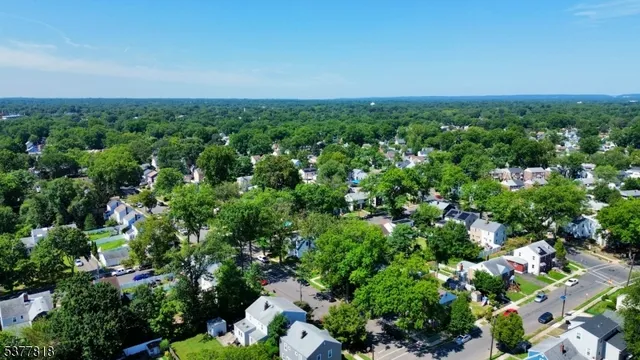 an aerial view of multiple house with outdoor space