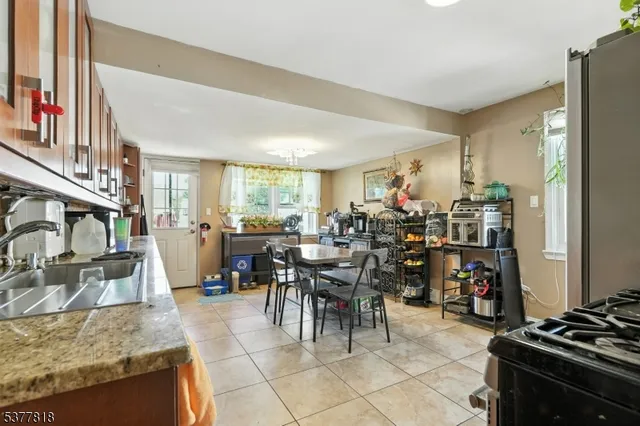 a view of a living room and dining room