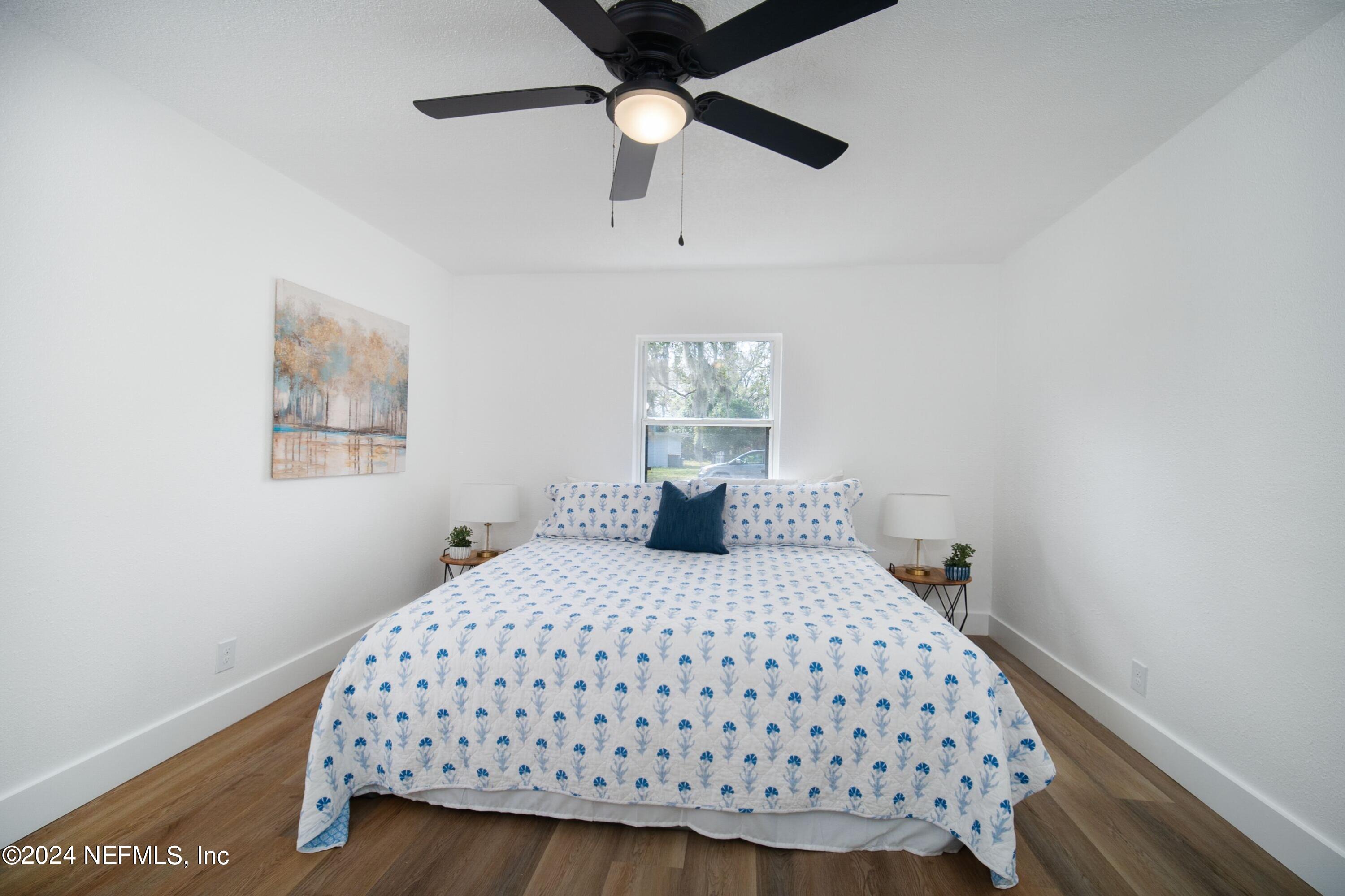 2589 Springmont Street Jacksonville, FL 32207 - Photo 40 of 71 a bedroom with a bed and window