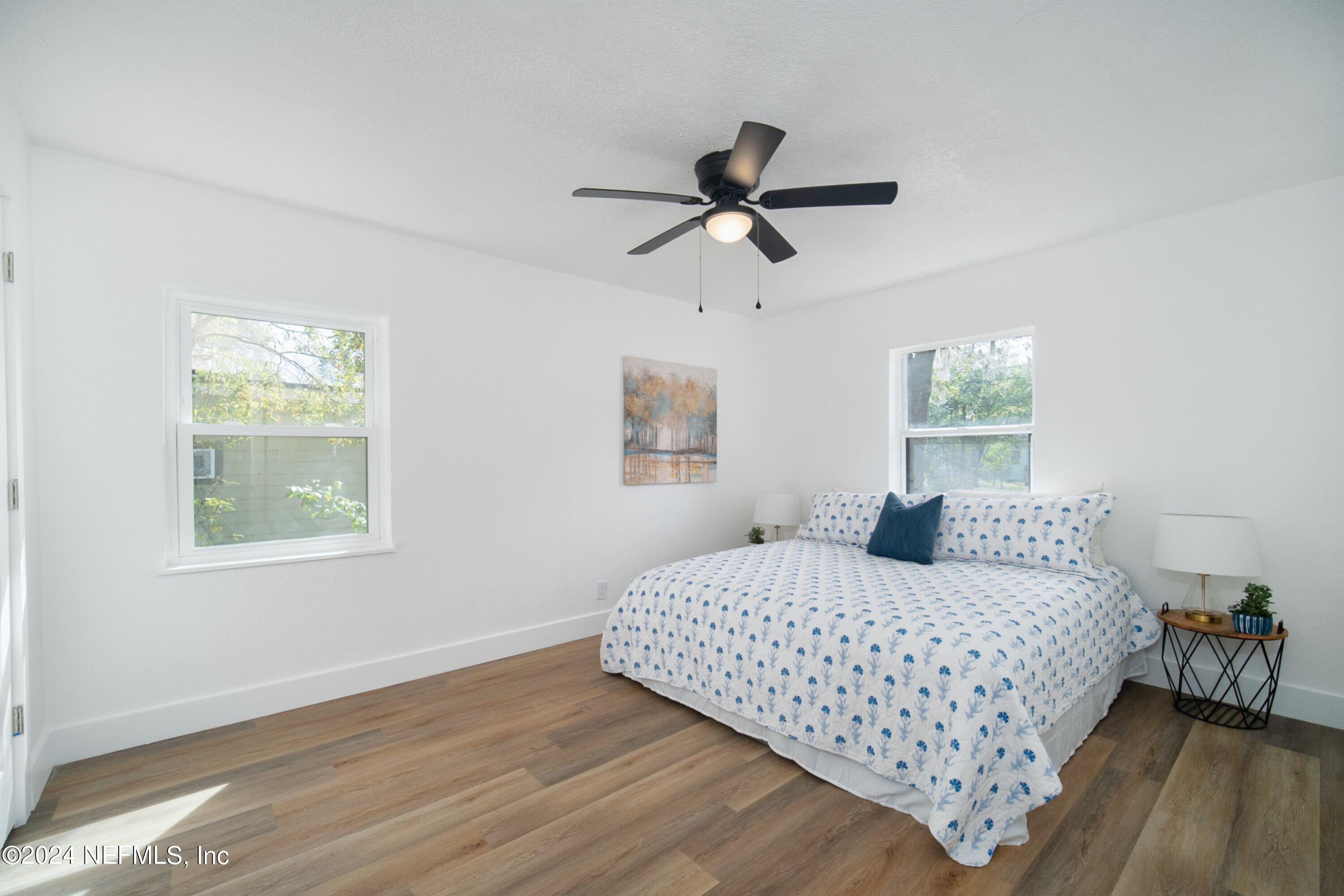 2589 Springmont Street Jacksonville, FL 32207 - Photo 4 of 71 a bedroom with a bed and window