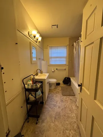 a view of storage and utility room