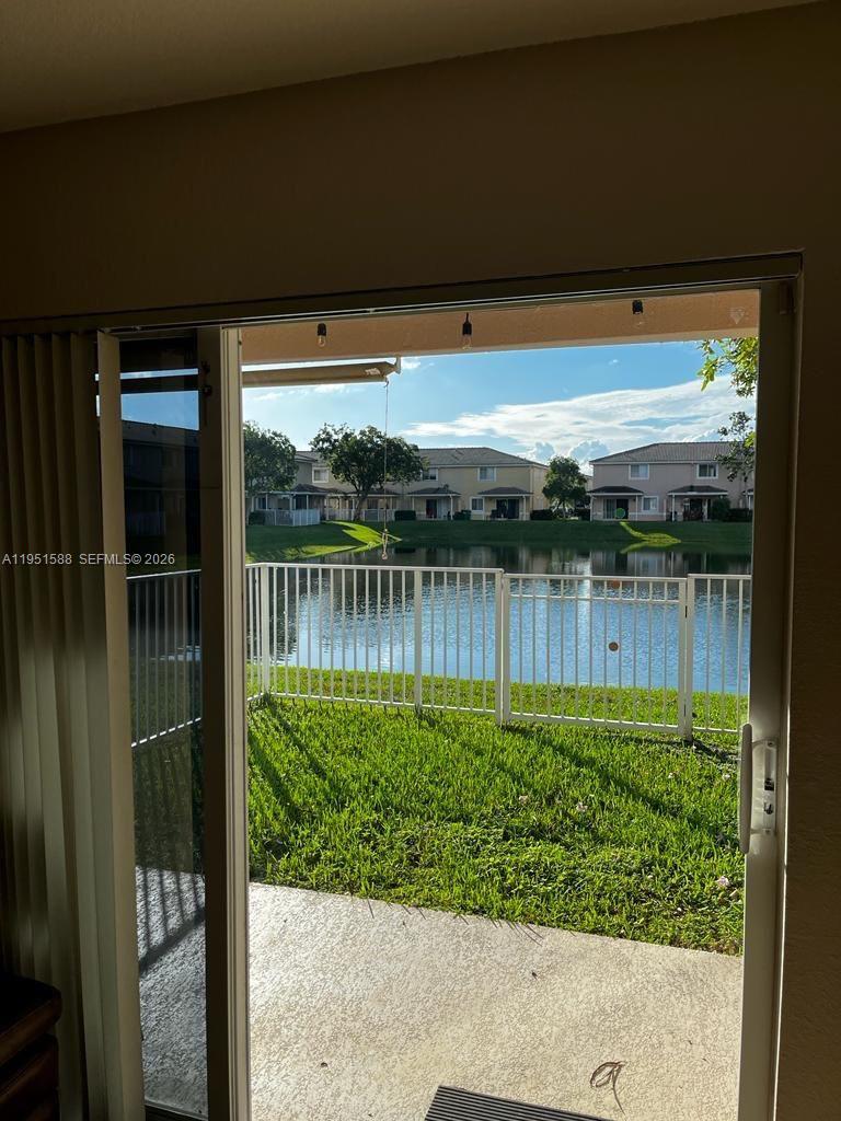 5923 Abbey Road, Unit 5923 Tamarac, FL 33321 - Photo 6 of 6 a view of a back yard