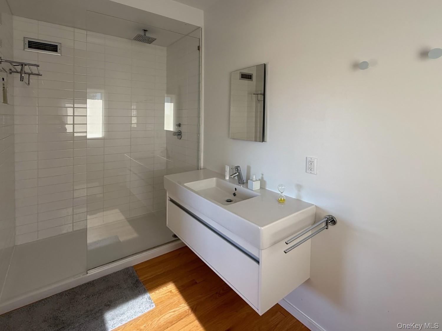 387 Tishauser Road Hudson, NY 12534 - Photo 11 of 20 a white bath tub sitting next to a white sink