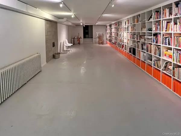 a hallway with windows in a room