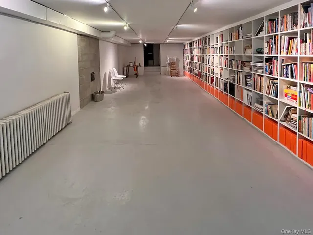 a hallway with windows in a room