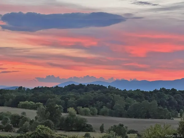 a view of a city with sunset view