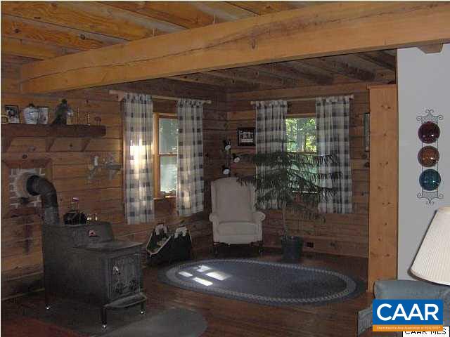 6037 Bell Road Dillwyn, VA 23936 - Photo 4 of 8 a room with table and chairs