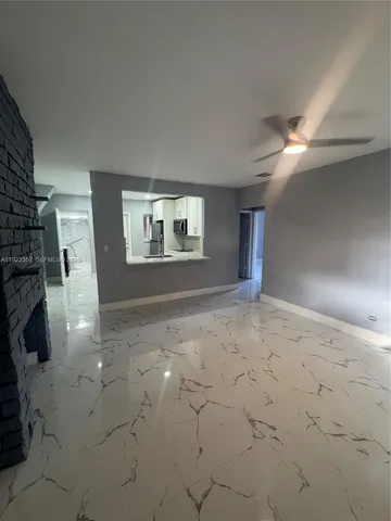 a view of livingroom and hardwood