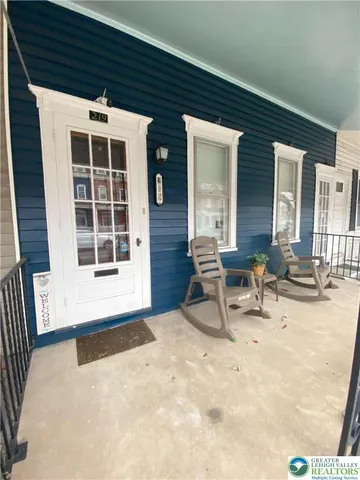 a view of a house with lounge chair