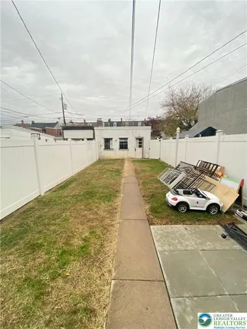 a view of swimming pool with seating area