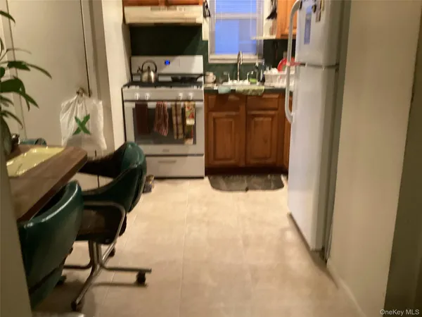 a room with furniture and a fireplace