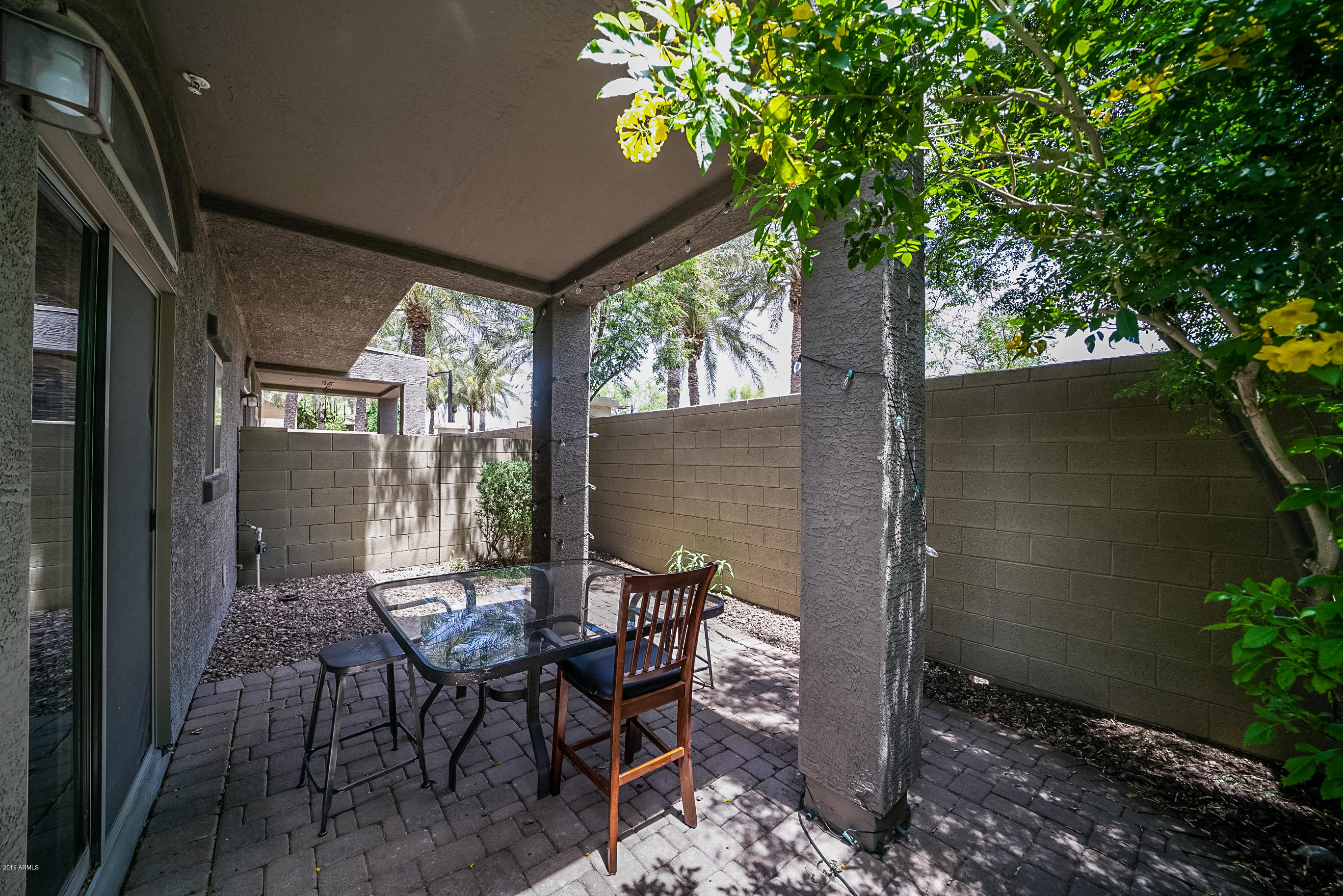 280 South Evergreen Road, Unit 1229 Tempe, AZ 85288 - Photo 23 of 31 a view of outdoor dining space with a porch