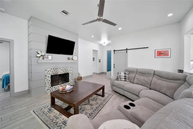 a view of a dining room with furniture and window