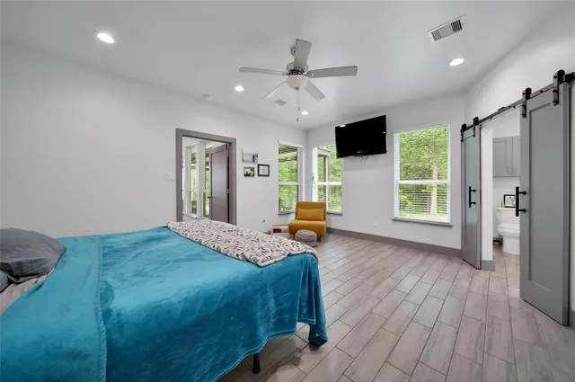 a bathroom with a double vanity sink and mirror