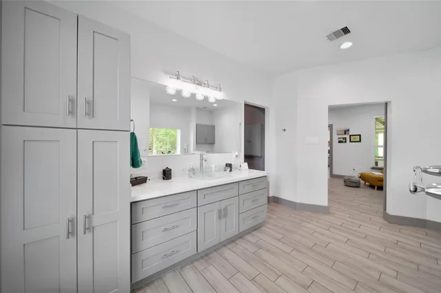 a living room with a couch and a window