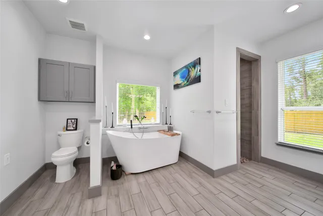 a close view of a shower and a sink