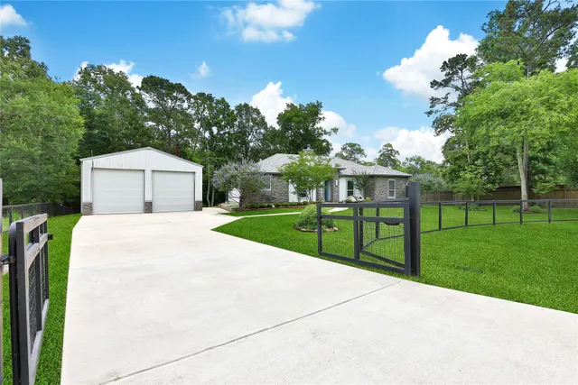 front view of a house with a garden