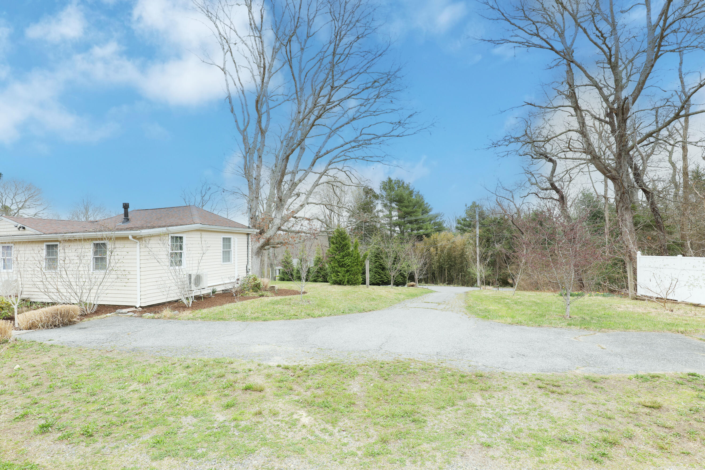 39 Lovell's Lane Mashpee, MA 02649 - Photo 22 of 24 a view of the house with a yard