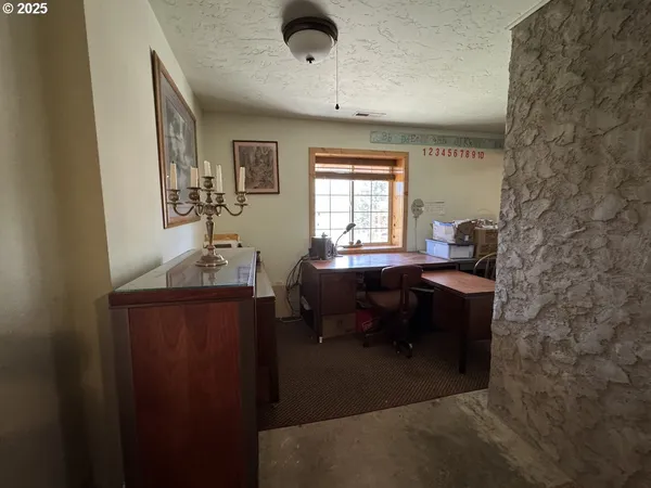 a workspace with furniture and window