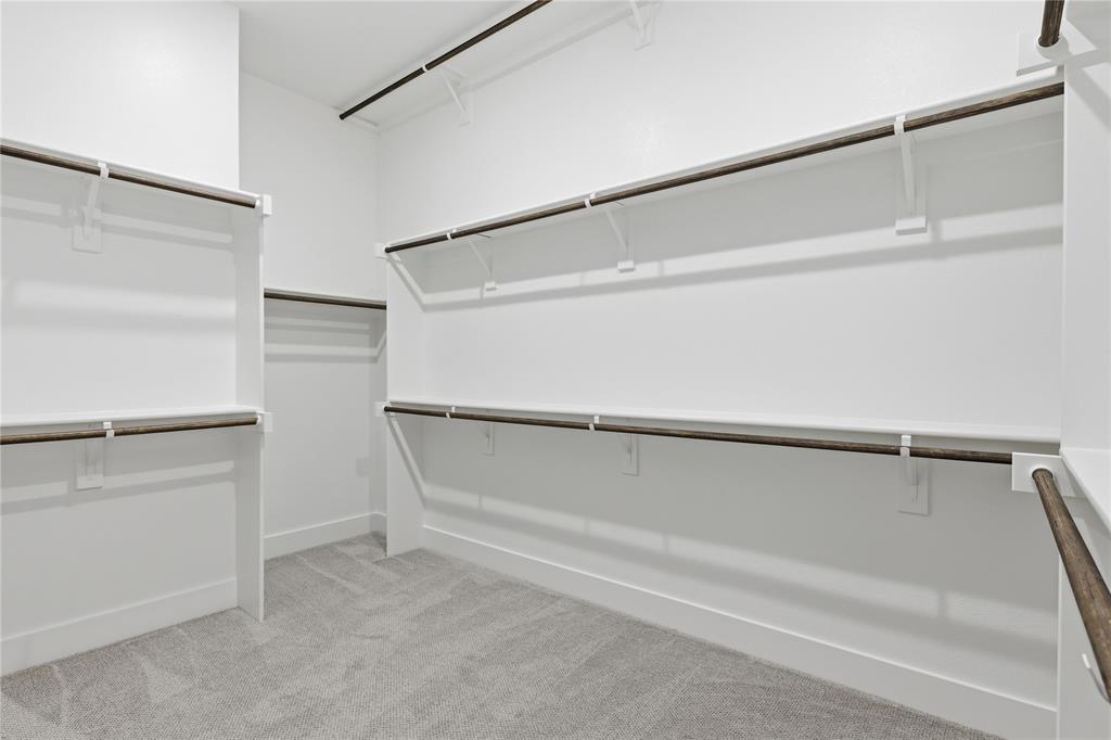 1653 Cedar Elm Way Burleson, TX 76028 - Photo 13 of 26 a view of an empty walk in closet