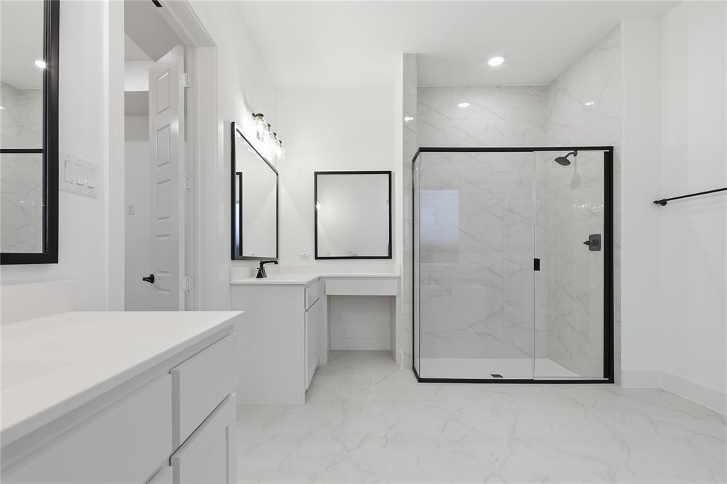 1653 Cedar Elm Way Burleson, TX 76028 - Photo 15 of 26 a bathroom with a double vanity sink mirror and double