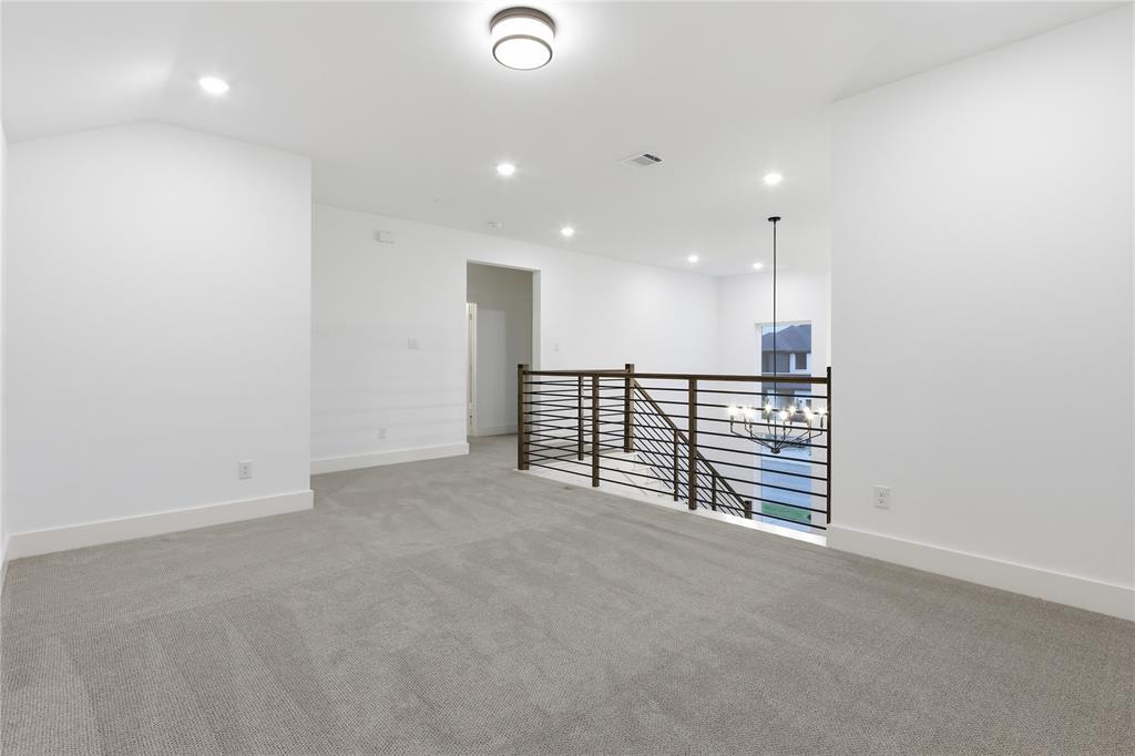 1653 Cedar Elm Way Burleson, TX 76028 - Photo 25 of 26 a view of an empty room with a kitchen