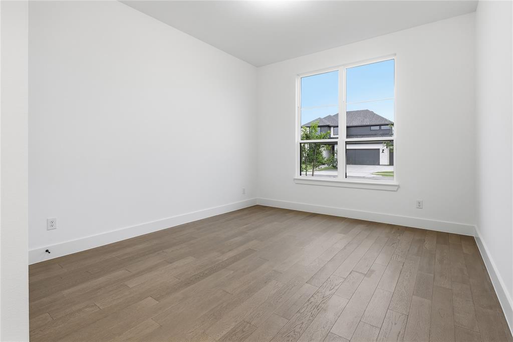 1653 Cedar Elm Way Burleson, TX 76028 - Photo 3 of 26 an empty room with wooden floor and windows