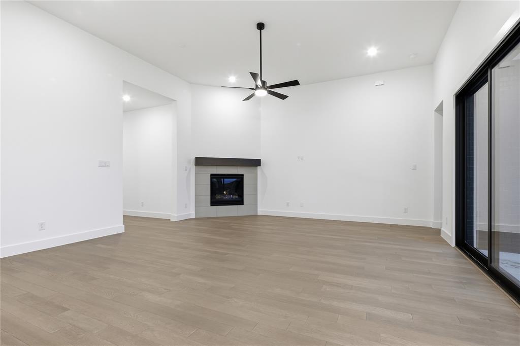 1653 Cedar Elm Way Burleson, TX 76028 - Photo 5 of 26 an empty room with fan and windows