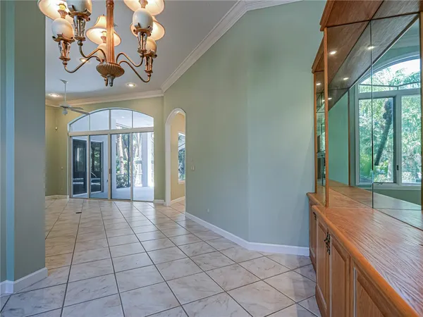 a view of a hallway with windows