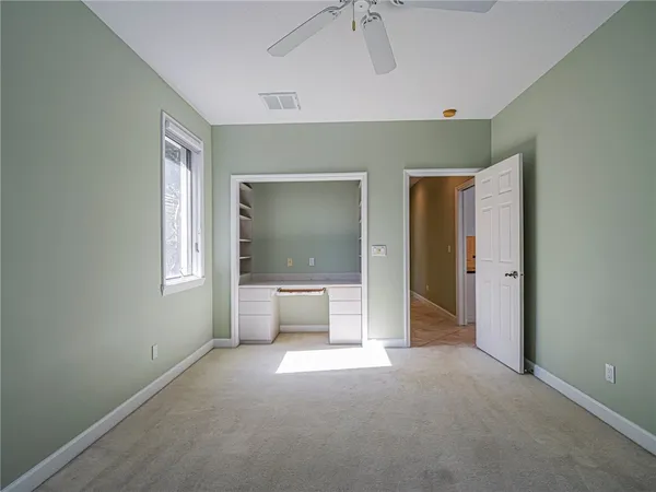 a view of a livingroom with a flat screen tv