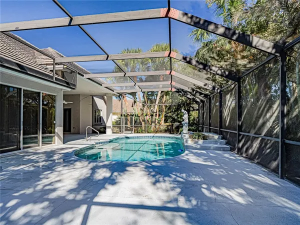 a view of a backyard with a patio