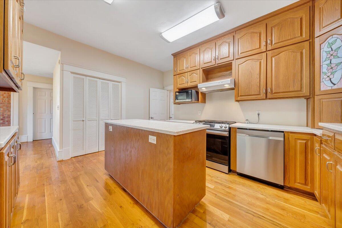 181 Chestnut Grove Road Callaway, VA 24067 - Photo 15 of 51 a kitchen with stainless steel appliances granite countertop a stove a sink and a refrigerator