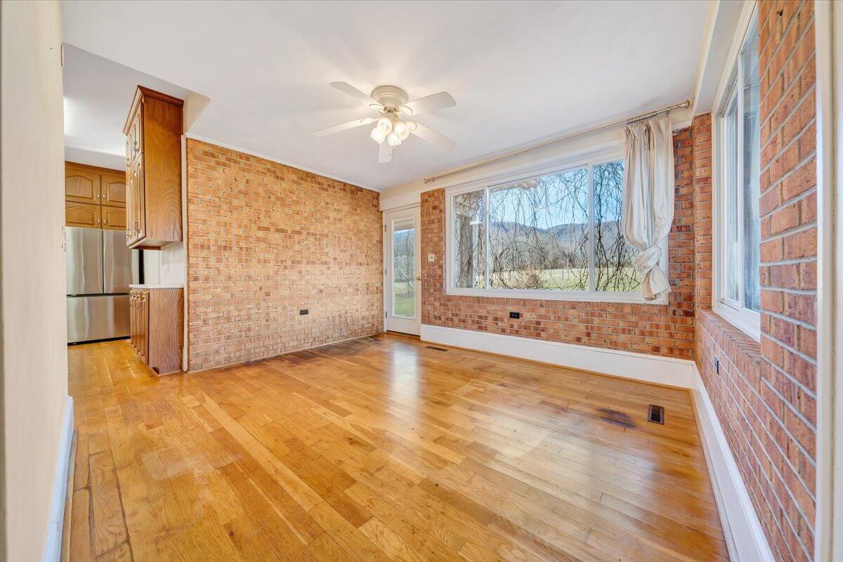 181 Chestnut Grove Road Callaway, VA 24067 - Photo 19 of 51 a view of an empty room with a window