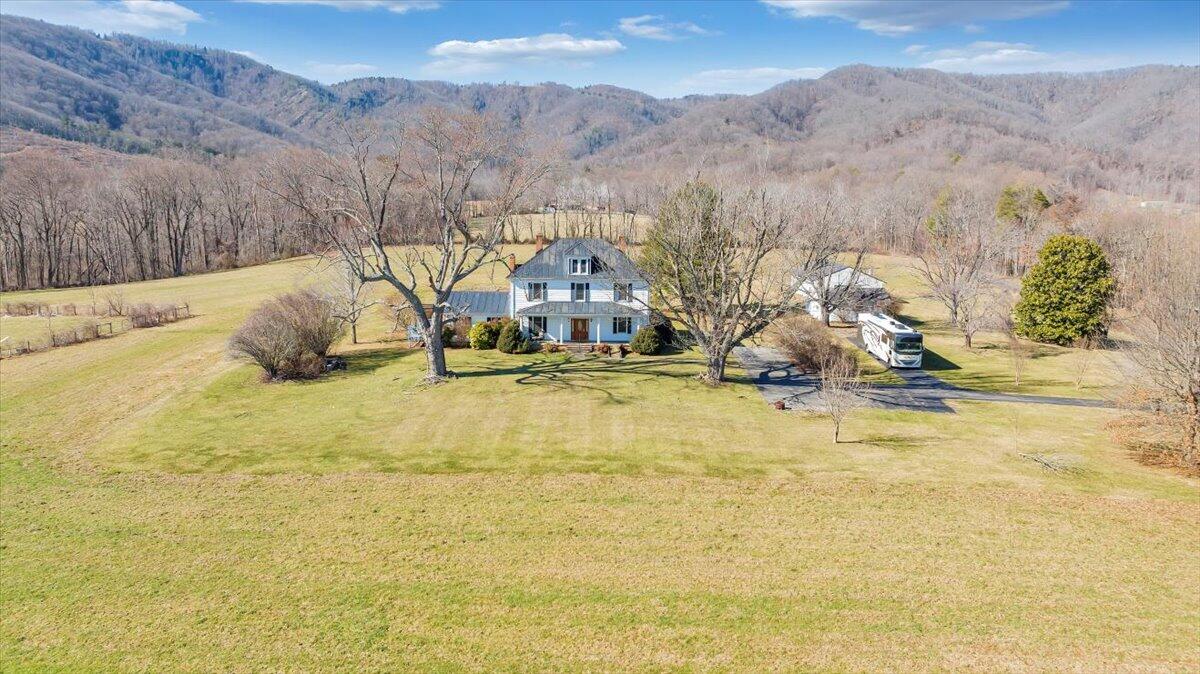 181 Chestnut Grove Road Callaway, VA 24067 - Photo 2 of 51 a view of a lake with a mountain