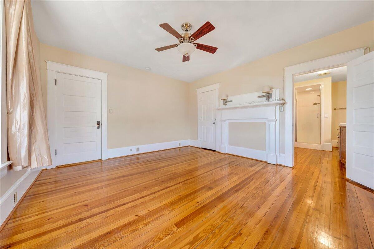 181 Chestnut Grove Road Callaway, VA 24067 - Photo 29 of 51 a view of empty room with wooden floor and ceiling fan