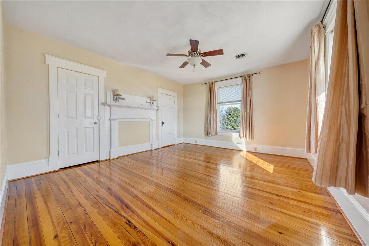 181 Chestnut Grove Road Callaway, VA 24067 - Photo 31 of 51 wooden floor in an empty room with a window